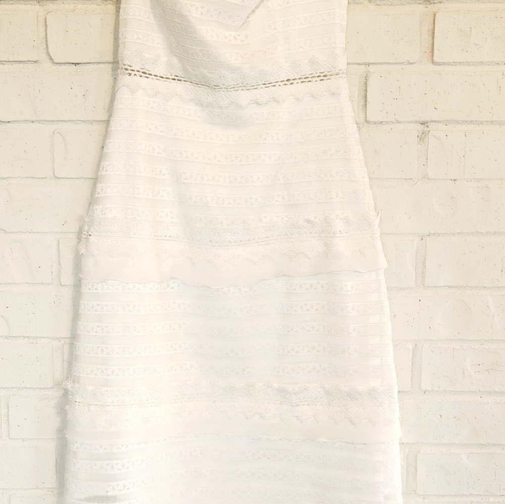 Delicate and elegant white lace dress